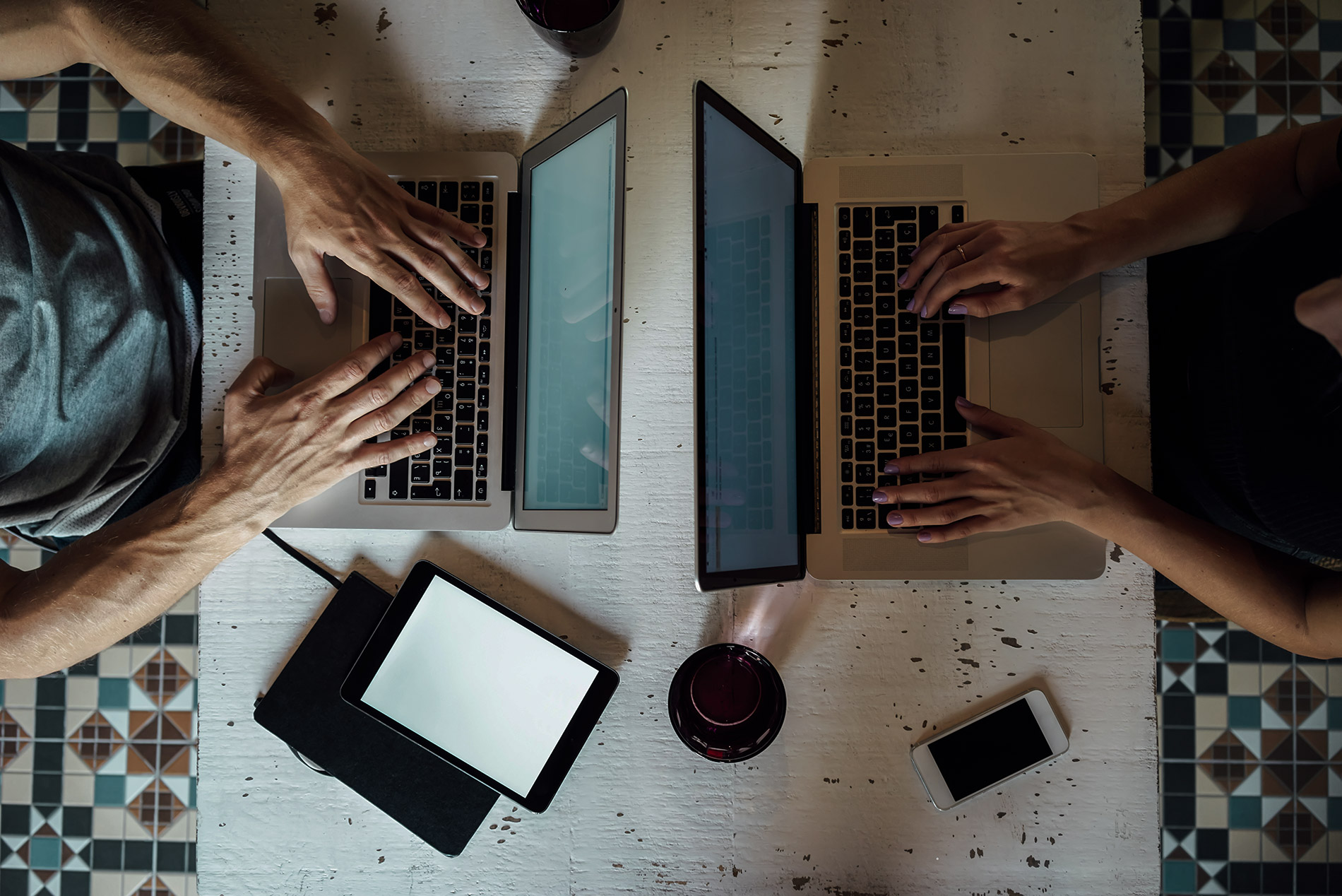 Man-Woman-Working-on-Computer_AdobeStock_102530896